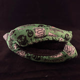 Green and silver wizard house inspired blade soakers detail view